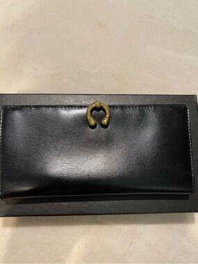 Gucci Black Leather Women's Clutch with Gold Accent